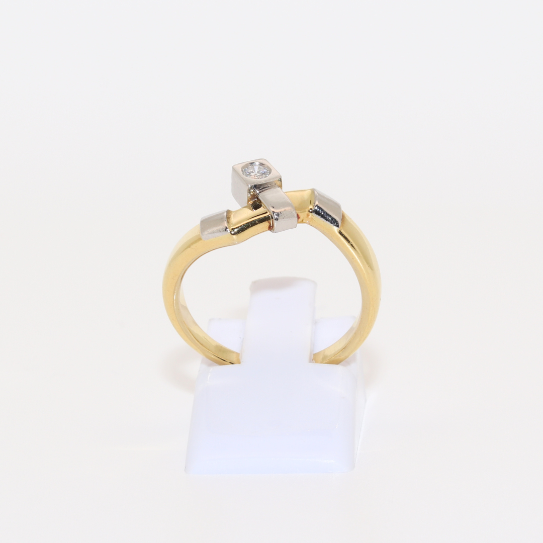 ANILLO BICOLOR CON BRILLANTE