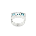 ANILLO ORO BLANCO 3 PIEDRAS AZULES Y DIAMANTES