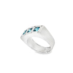ANILLO ORO BLANCO 3 PIEDRAS AZULES Y DIAMANTES