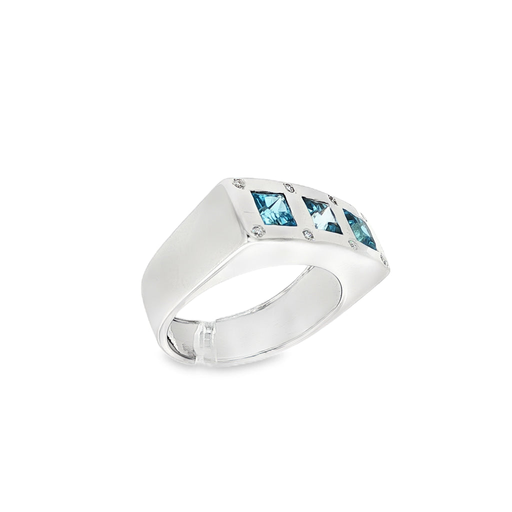 ANILLO ORO BLANCO 3 PIEDRAS AZULES Y DIAMANTES