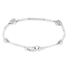 CONJUNTO COLLAR, PULSERA, SORTIJA Y PENDIENTES ORO BLANCO Y BRILLANTES
