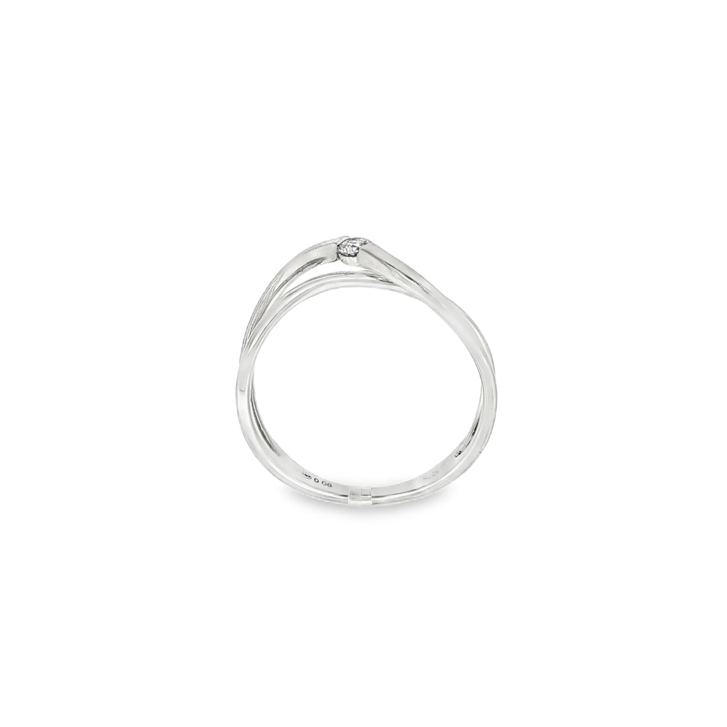 ANILLO ORO BLANCO Y DIAMANTE CRUZADO