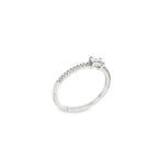 ANILLO ORO BLANCO CON DIAMANTE BAGUETTE Y PUNTAS DE DIAMANTE