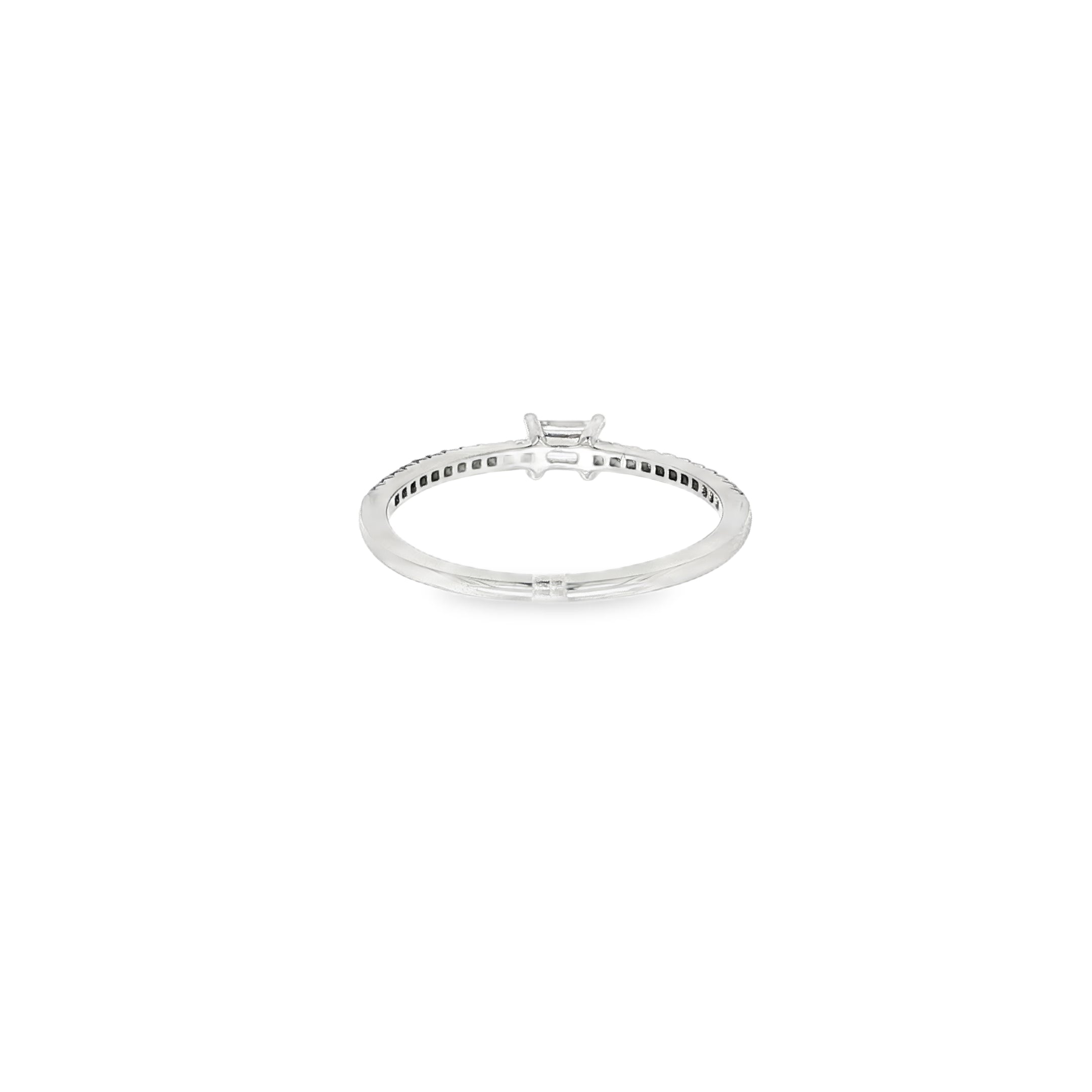 ANILLO ORO BLANCO CON DIAMANTE BAGUETTE Y PUNTAS DE DIAMANTE
