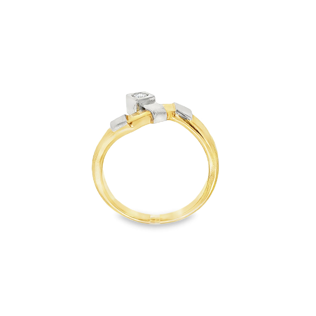 ANILLO BICOLOR CON BRILLANTE