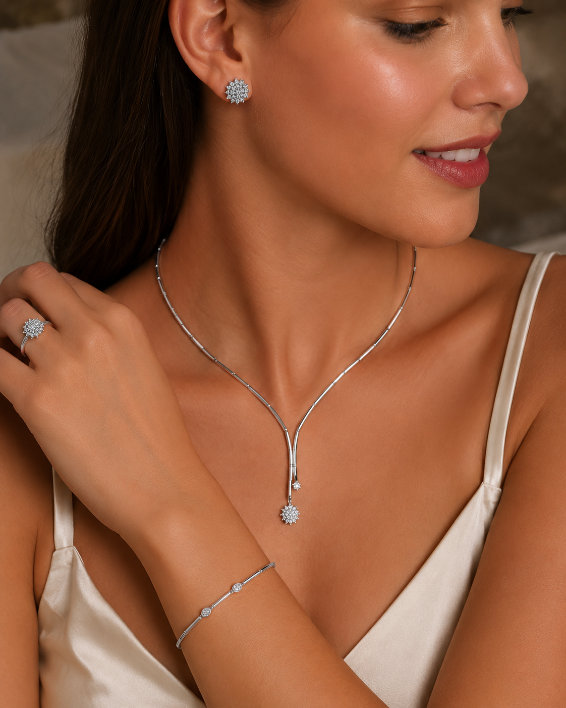 CONJUNTO COLLAR, PULSERA, SORTIJA Y PENDIENTES ORO BLANCO Y BRILLANTES