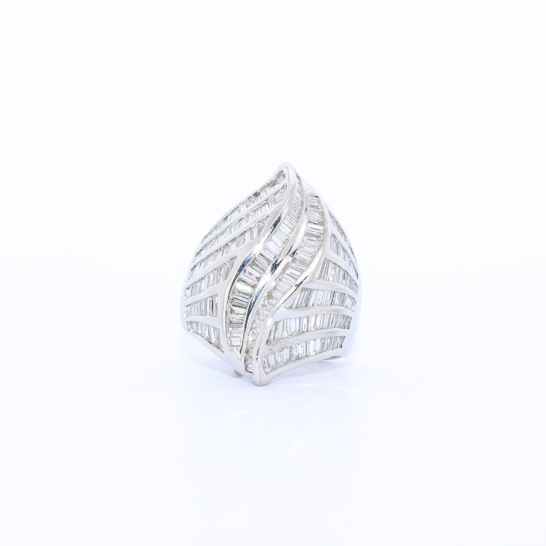 ANILLO CARACOL ORO BLANCO CON DIAMANTES BAGUET