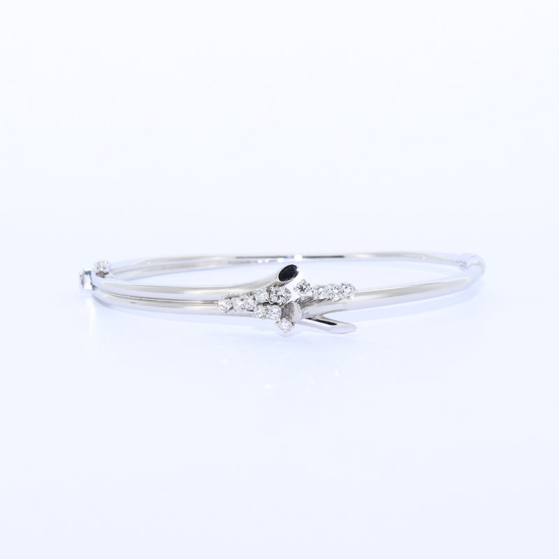 PULSERA RIGIDA ORO BLANCO Y BRILLANTES