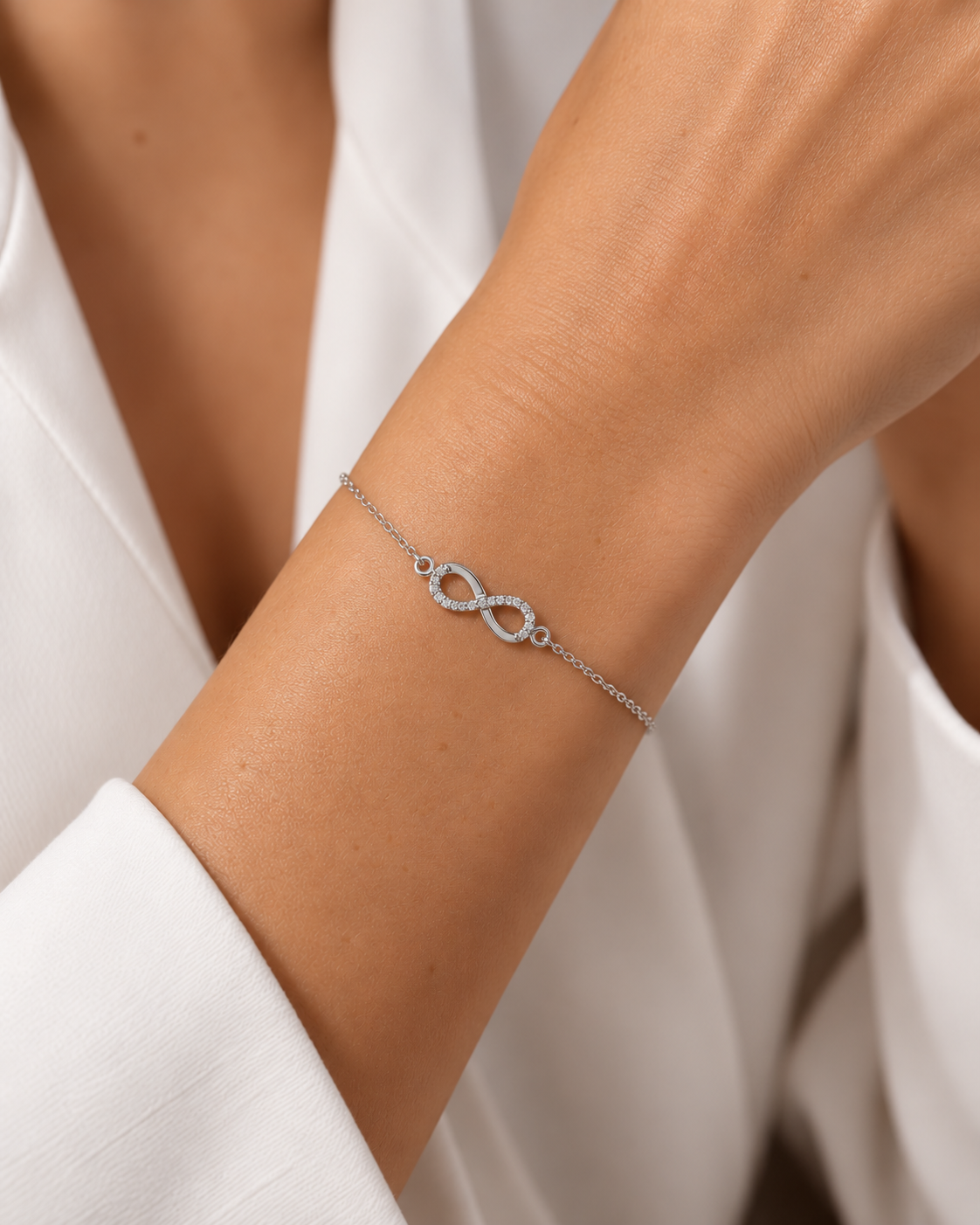 PULSERA INFINITO ORO BLANCO CON CIRCONITAS