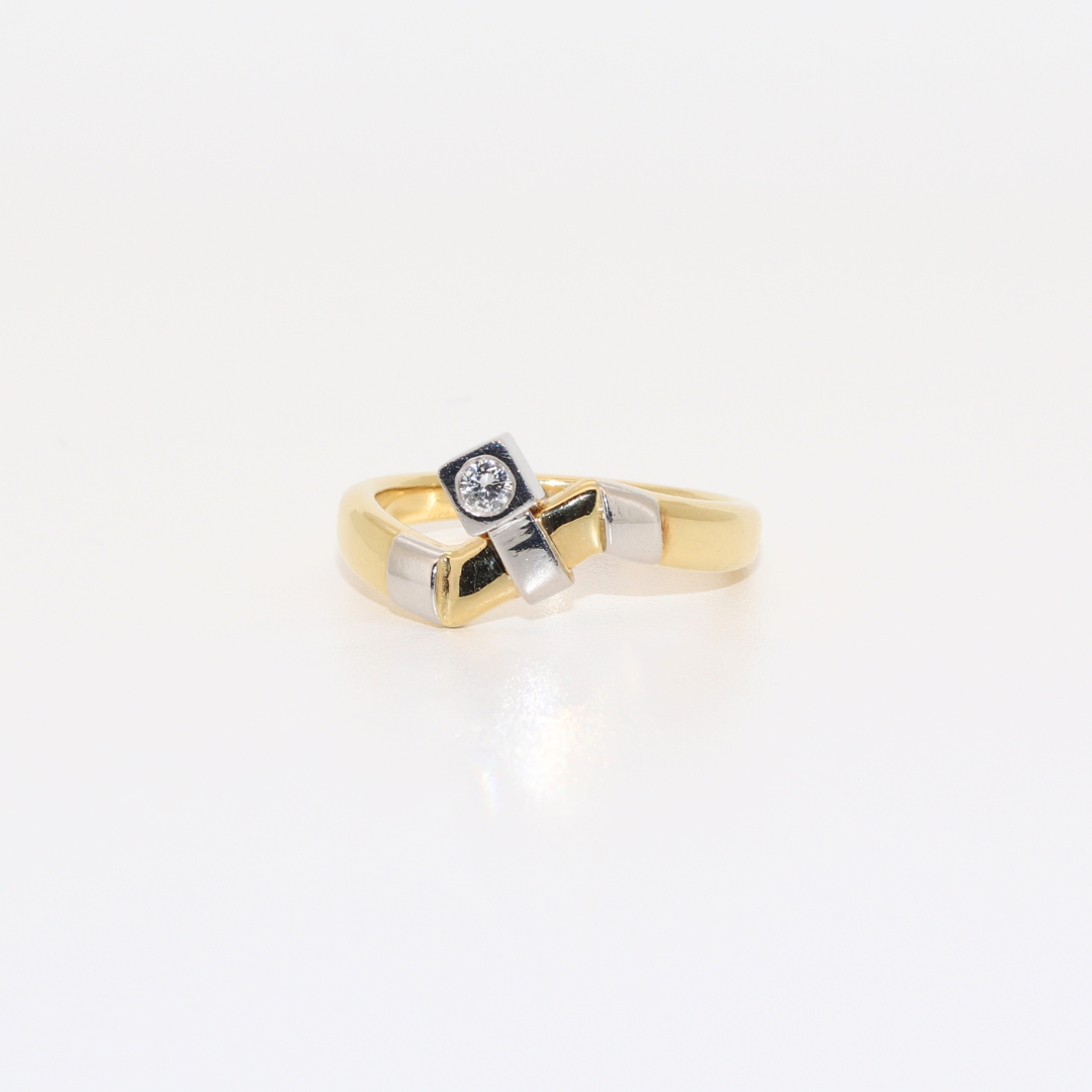 ANILLO BICOLOR CON BRILLANTE