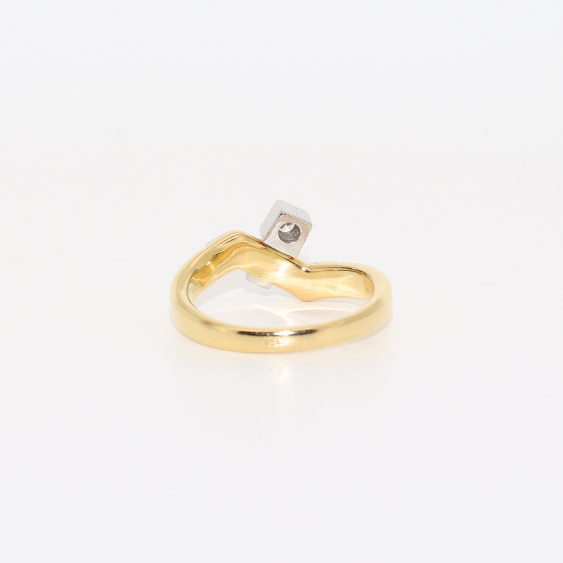 ANILLO BICOLOR CON BRILLANTE