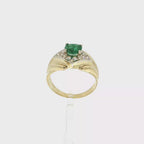 ANILLO CON ESMERALDA Y CIRCONITAS