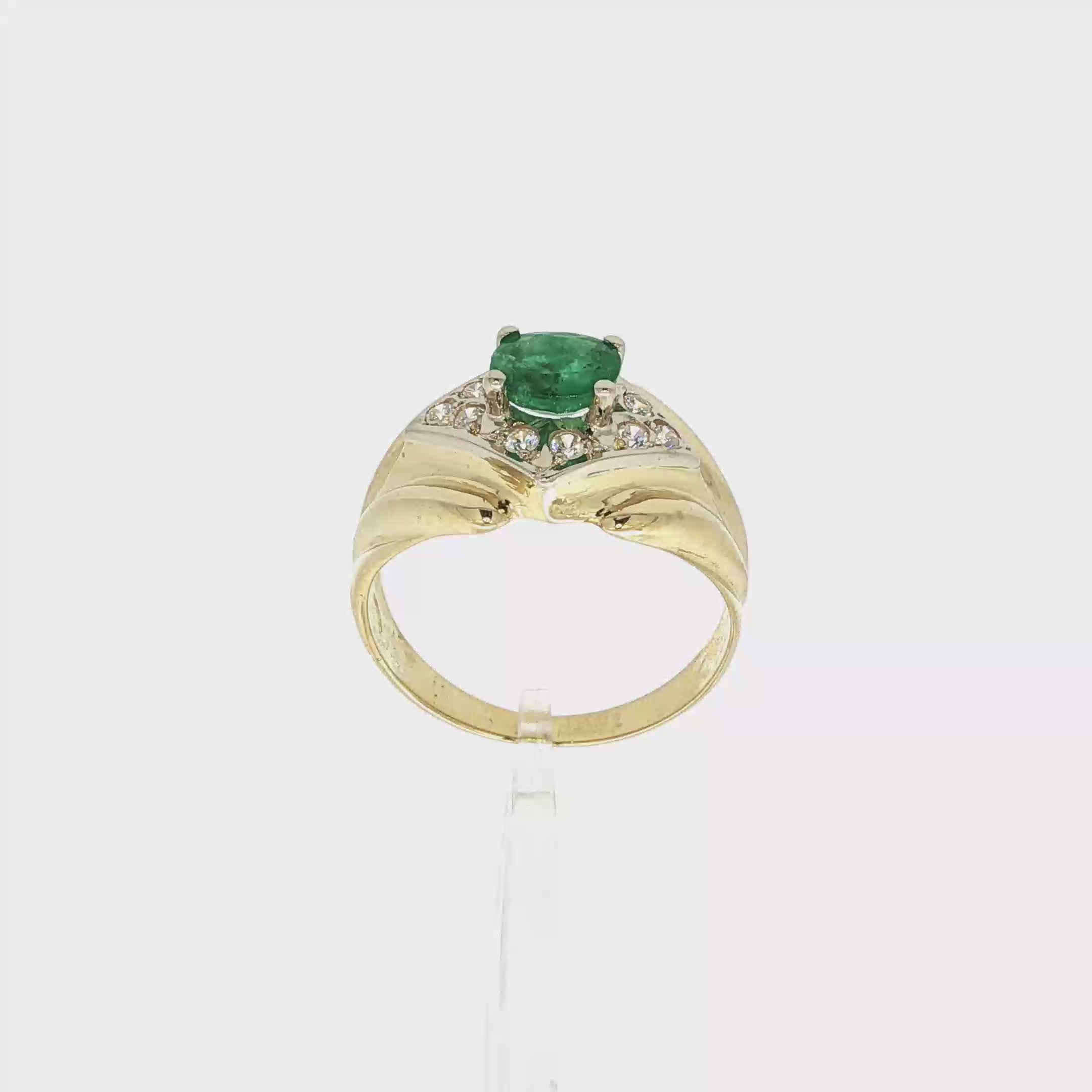 ANILLO CON ESMERALDA Y CIRCONITAS