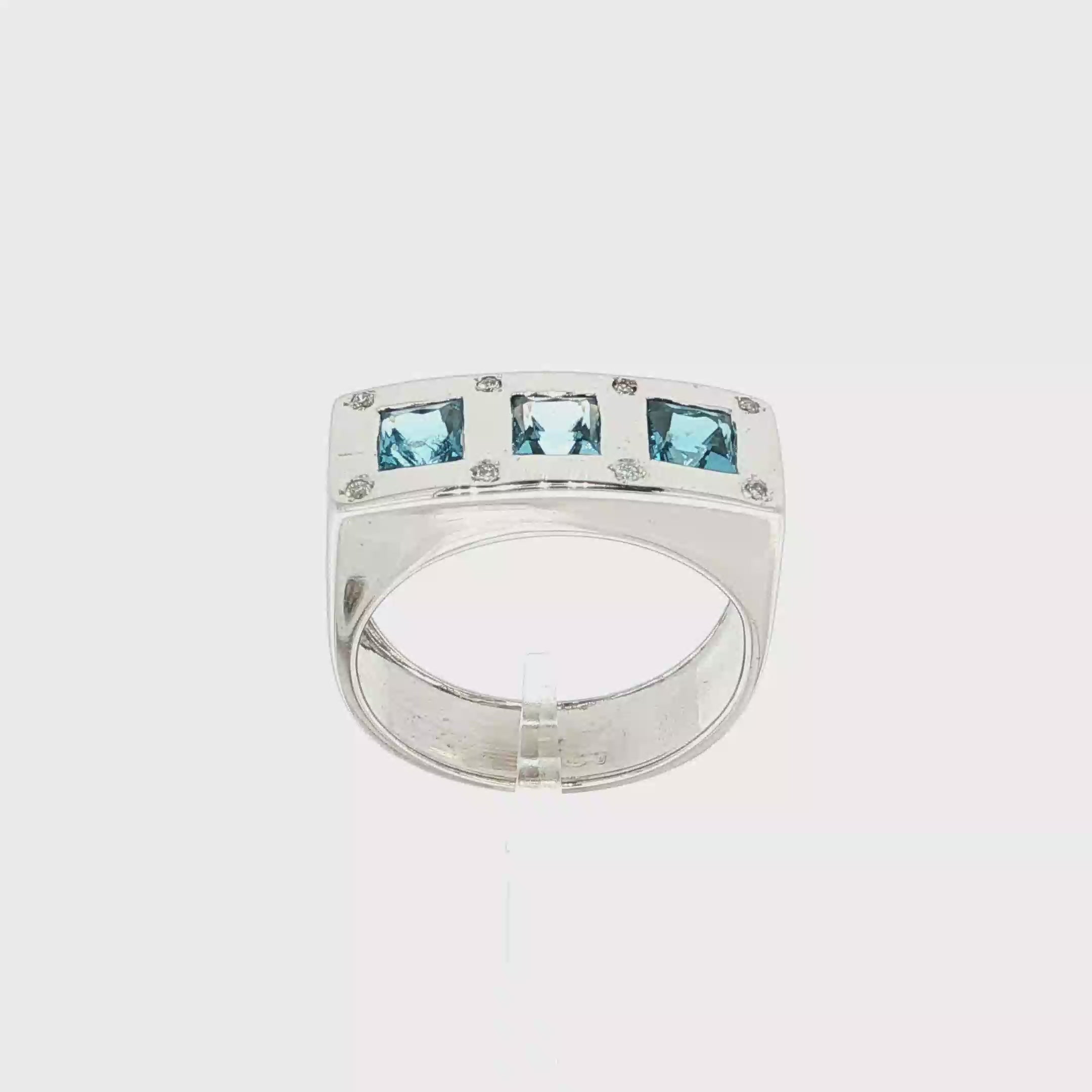 ANILLO ORO BLANCO 3 PIEDRAS AZULES Y DIAMANTES