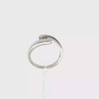 ANILLO CRUZADO ORO BLANCO CON BRILLANTE