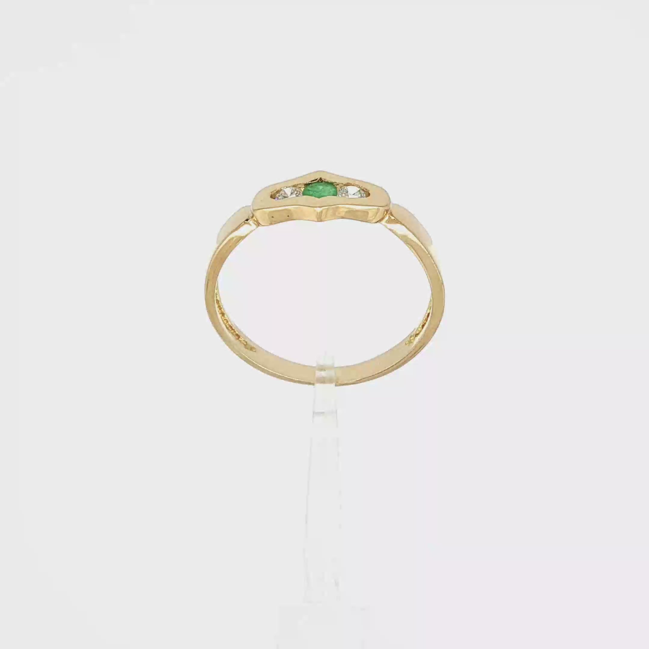 ANILLO CON CIRCONITAS Y ESMERALDA